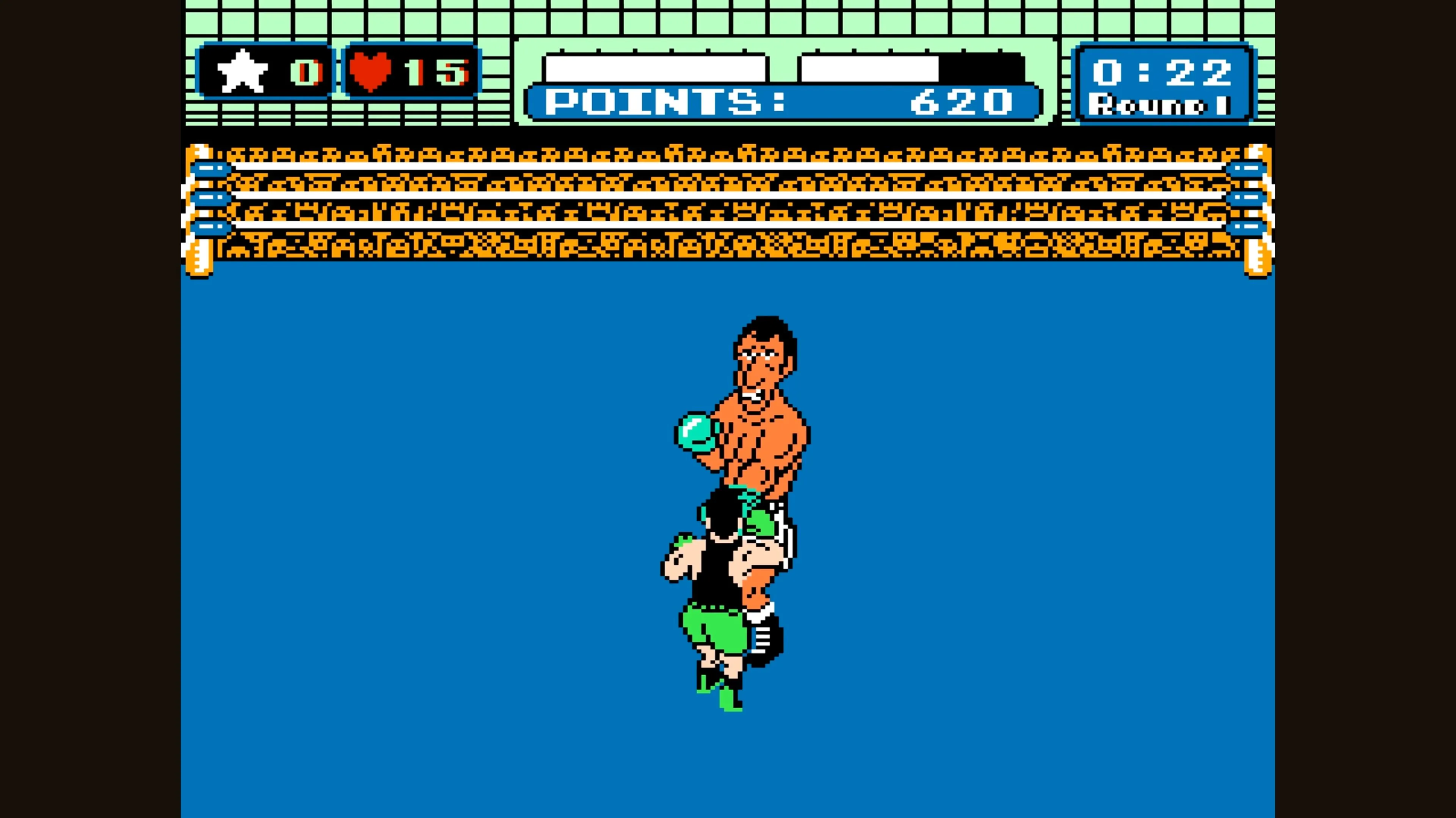 Cận cảnh Little Mac và đối thủ của anh ấy chuẩn bị ra đòn trong Punch-Out!!.