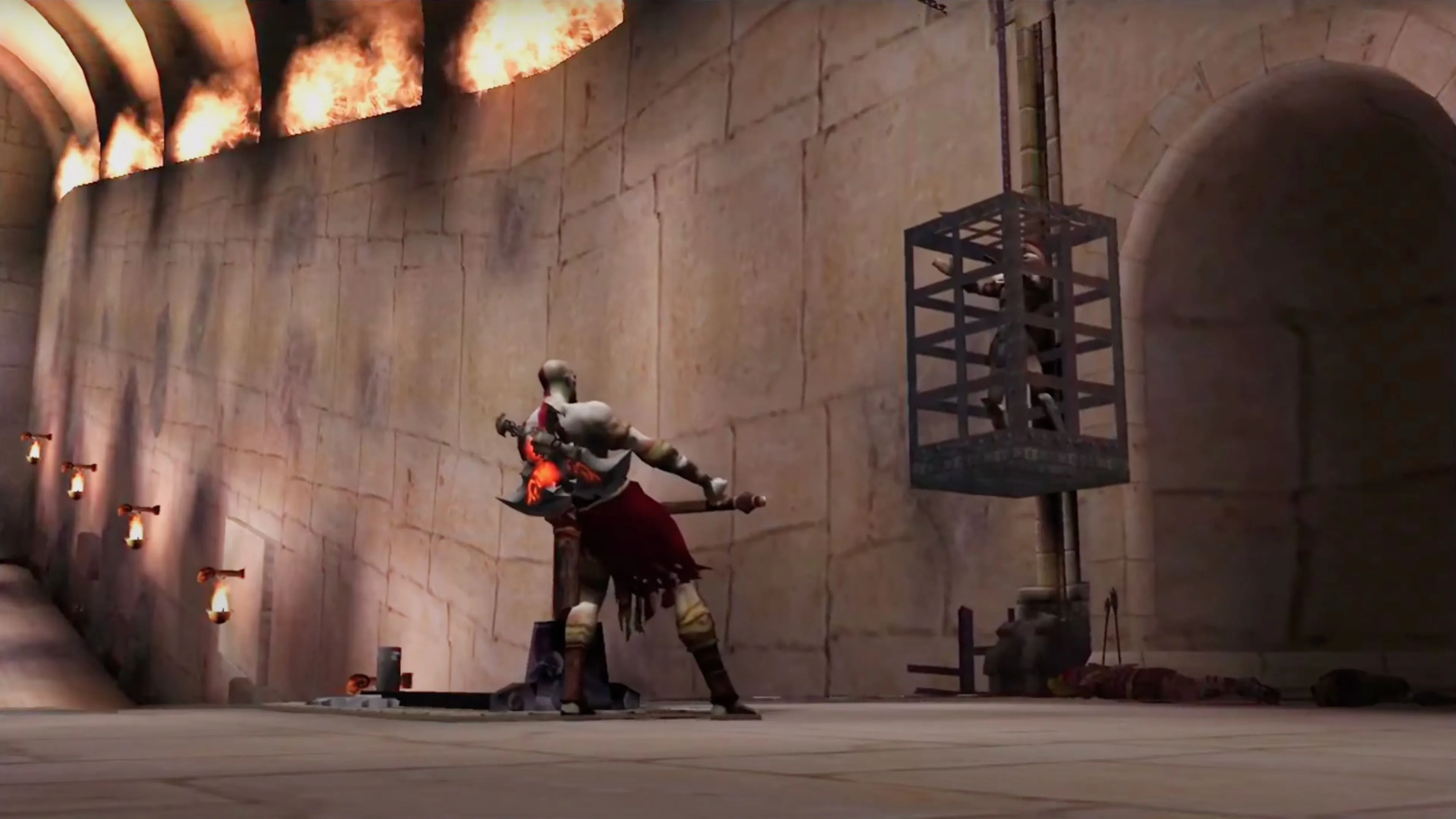 Cảnh Kratos đối mặt với những kẻ thù trong một hang động tối tăm của God of War (2005).