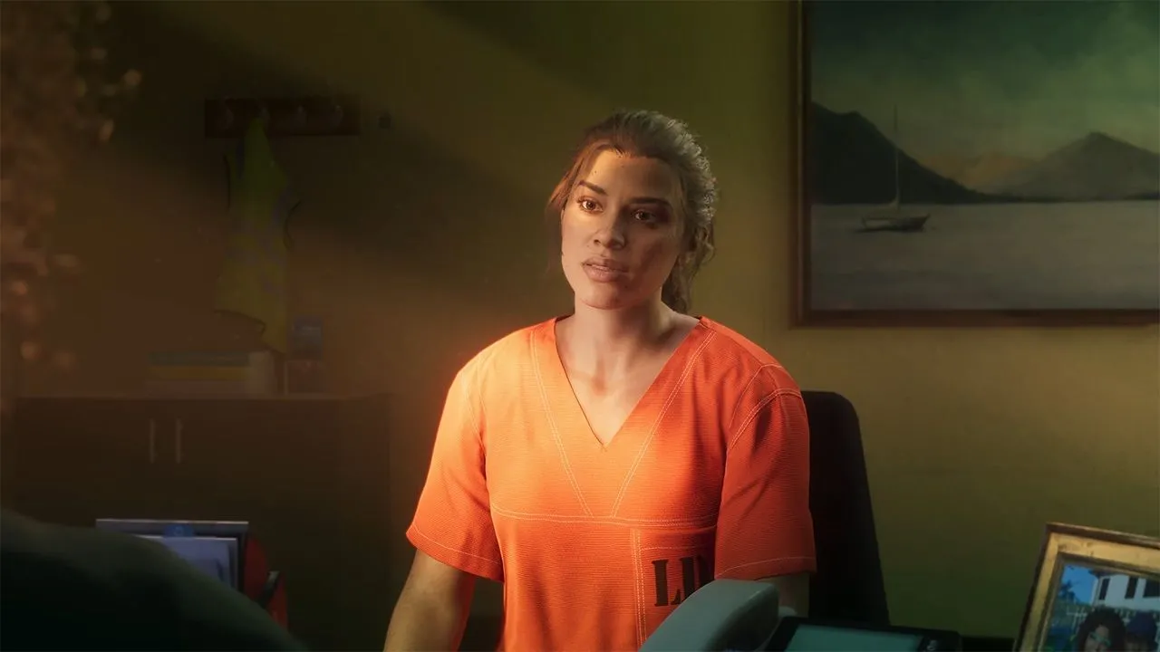 Cảnh quay từ game Grand Theft Auto VI với nhân vật nữ mặc bộ đồ tù nhân ngồi trong văn phòng, minh họa đồ họa ấn tượng của game thế hệ mới.