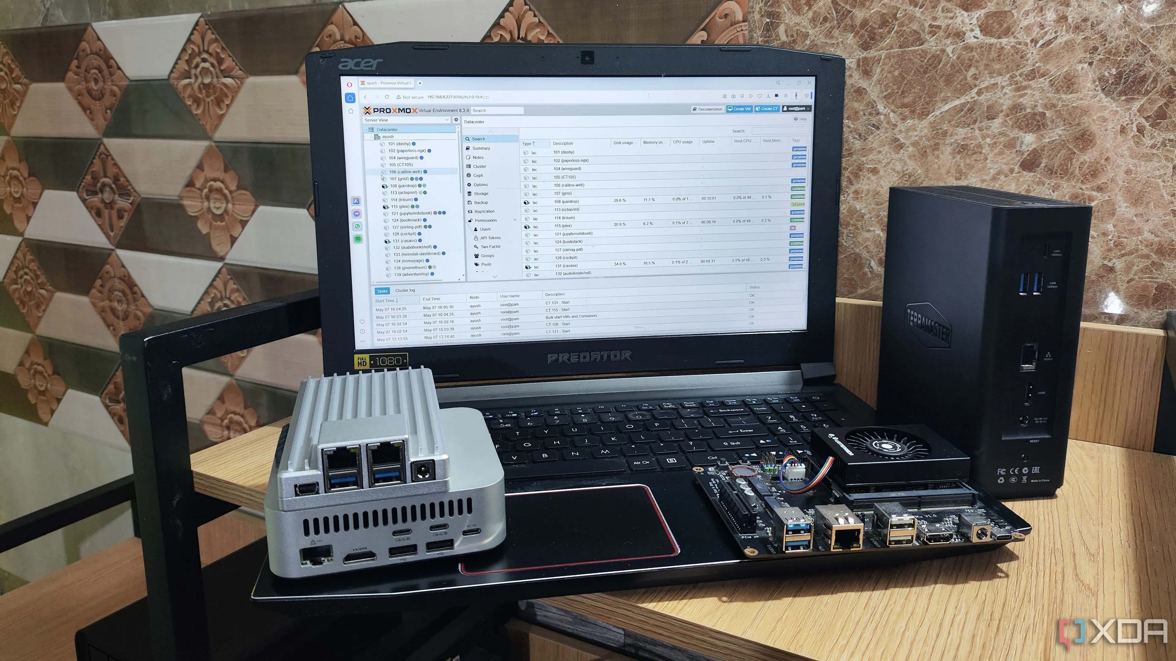 Giao diện web Proxmox truy cập từ laptop, phục vụ giải pháp lưu trữ dữ liệu tự động cho người du lịch.