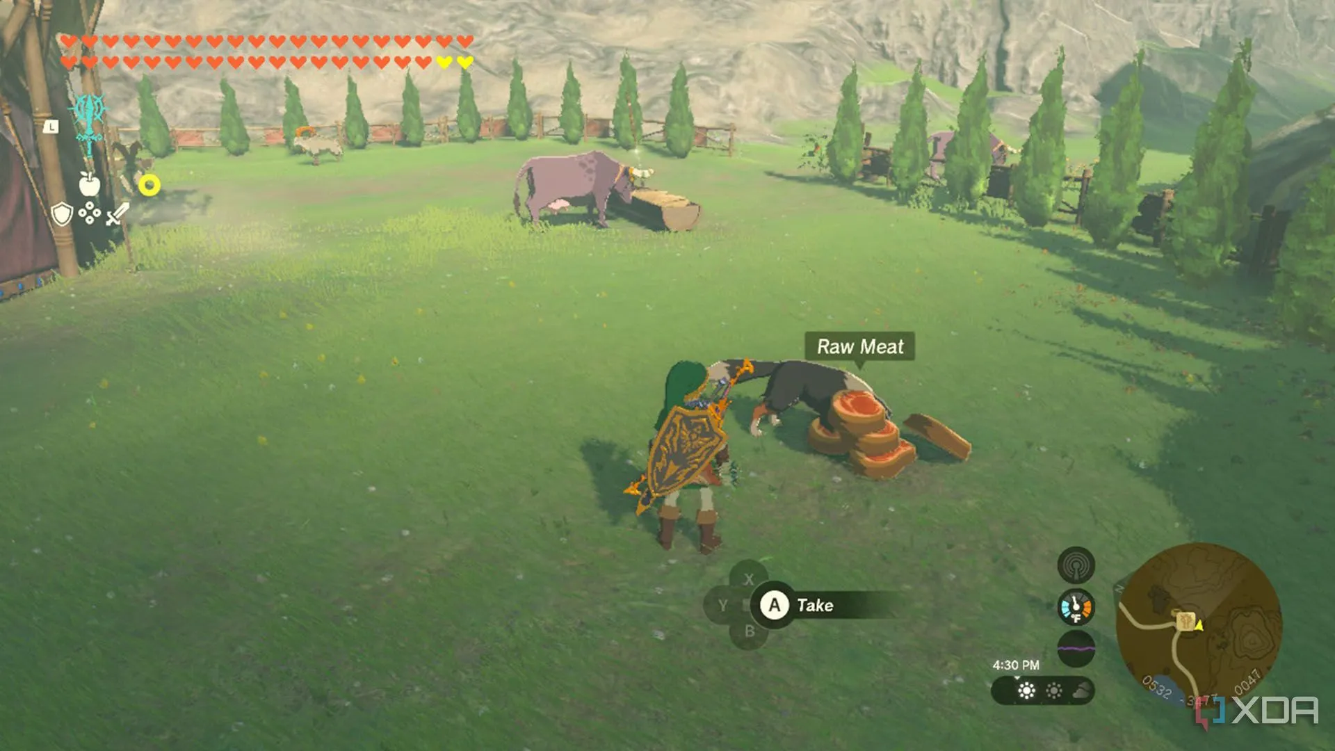 Link đang cho một chú chó ăn tại chuồng ngựa trong The Legend of Zelda: Tears of the Kingdom để tìm kho báu