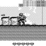 Màn hình game Toxic Crusaders trên Game Boy, hiển thị lối chơi đánh đấm cuộn ngang với nhân vật chính Toxie.