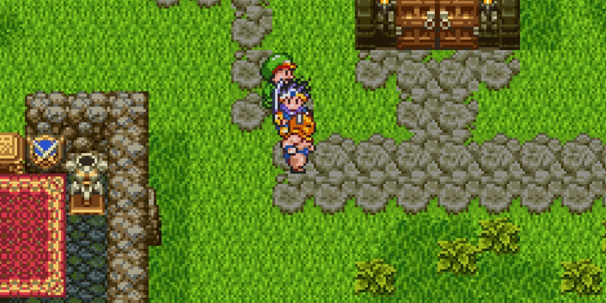 Một thị trấn với kiến trúc Trung Cổ và cây cối, trong cảnh chơi game Dragon Quest III.