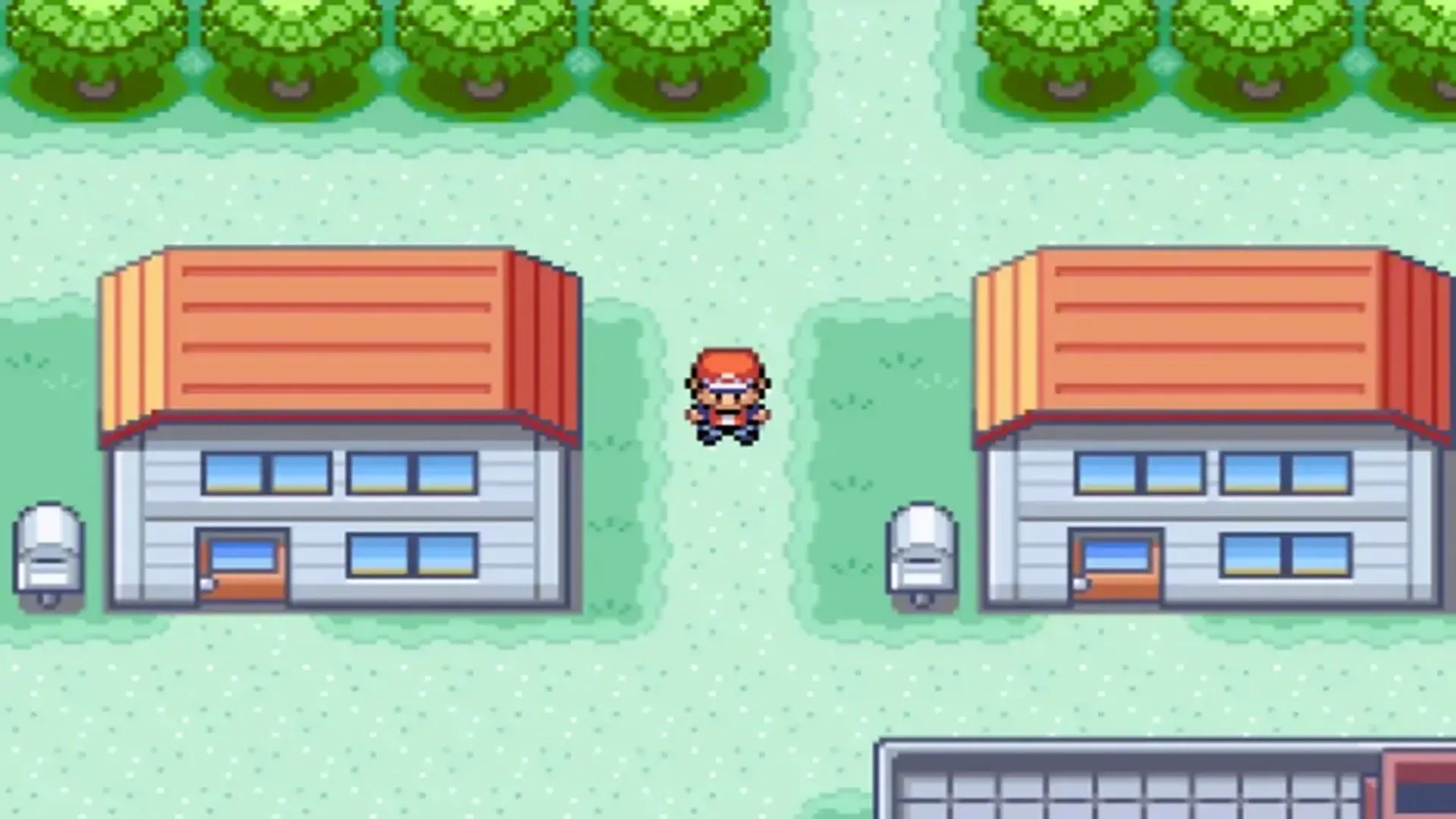 Người chơi khám phá một thị trấn trong thế giới game Pokémon FireRed bản làm lại trên Game Boy Advance.