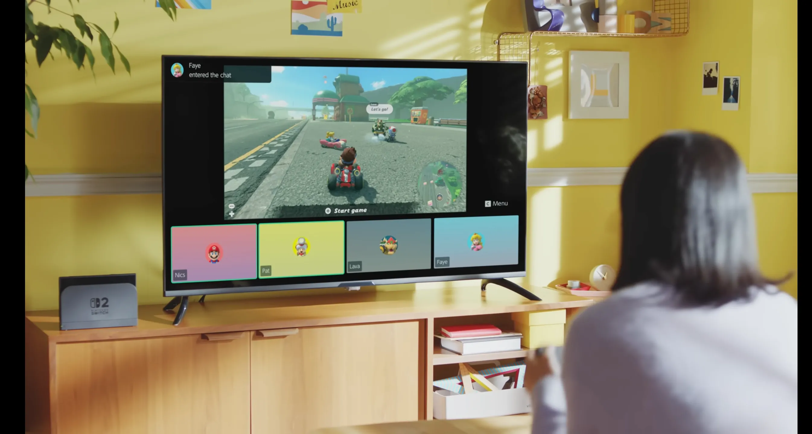 Người dùng trải nghiệm game trên máy Nintendo Switch 2 qua TV và giao diện GameChat.