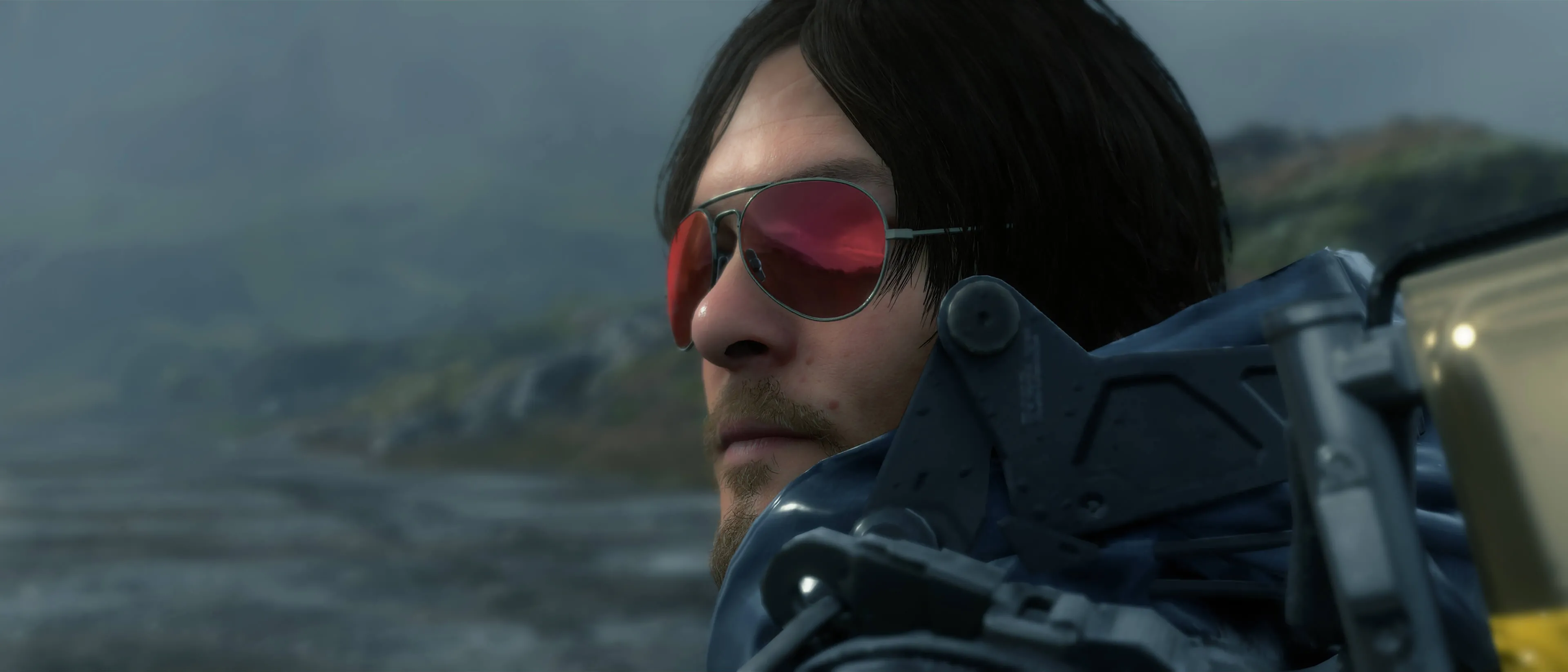 Người vận chuyển Sam Porter Bridges với chiếc kính râm trong tựa game Death Stranding.