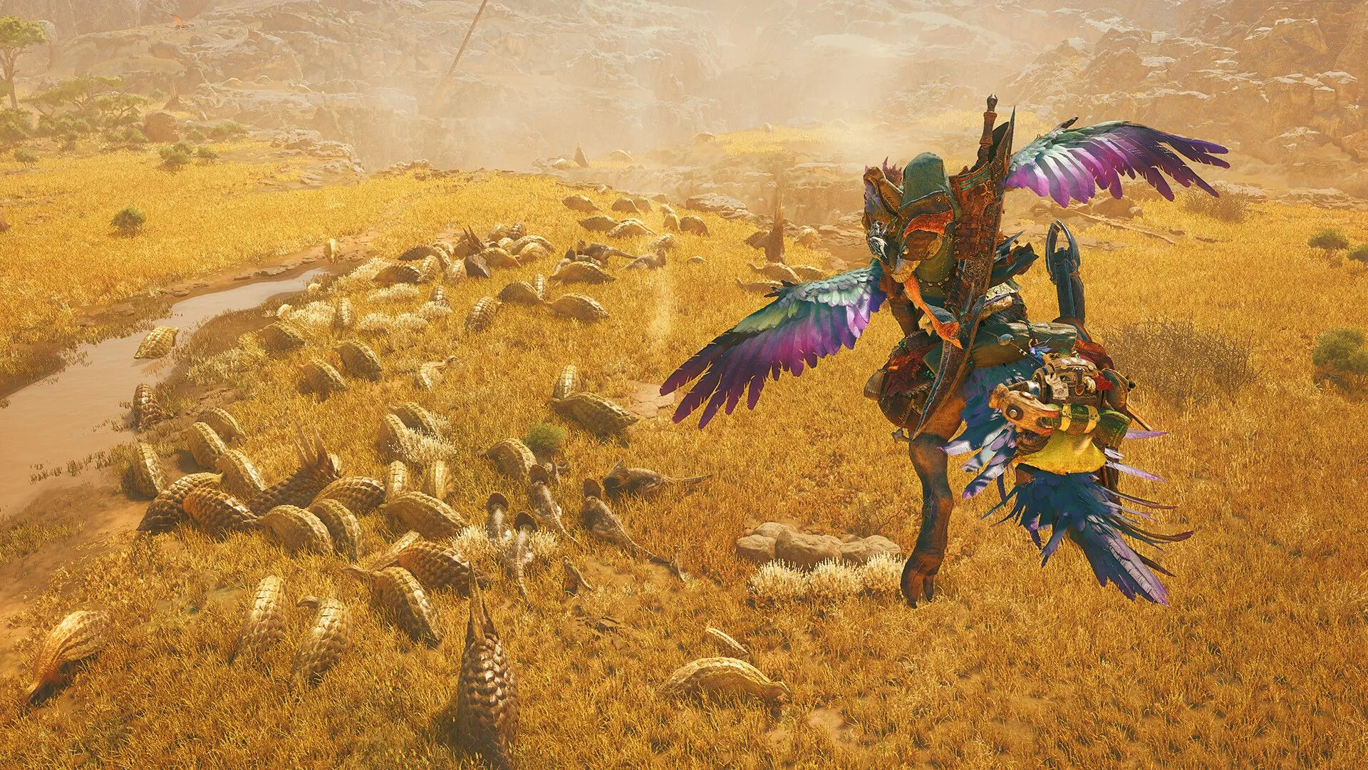 Nhân vật thợ săn và thú cưỡi đi qua vùng đất rộng lớn trong Monster Hunter Wilds