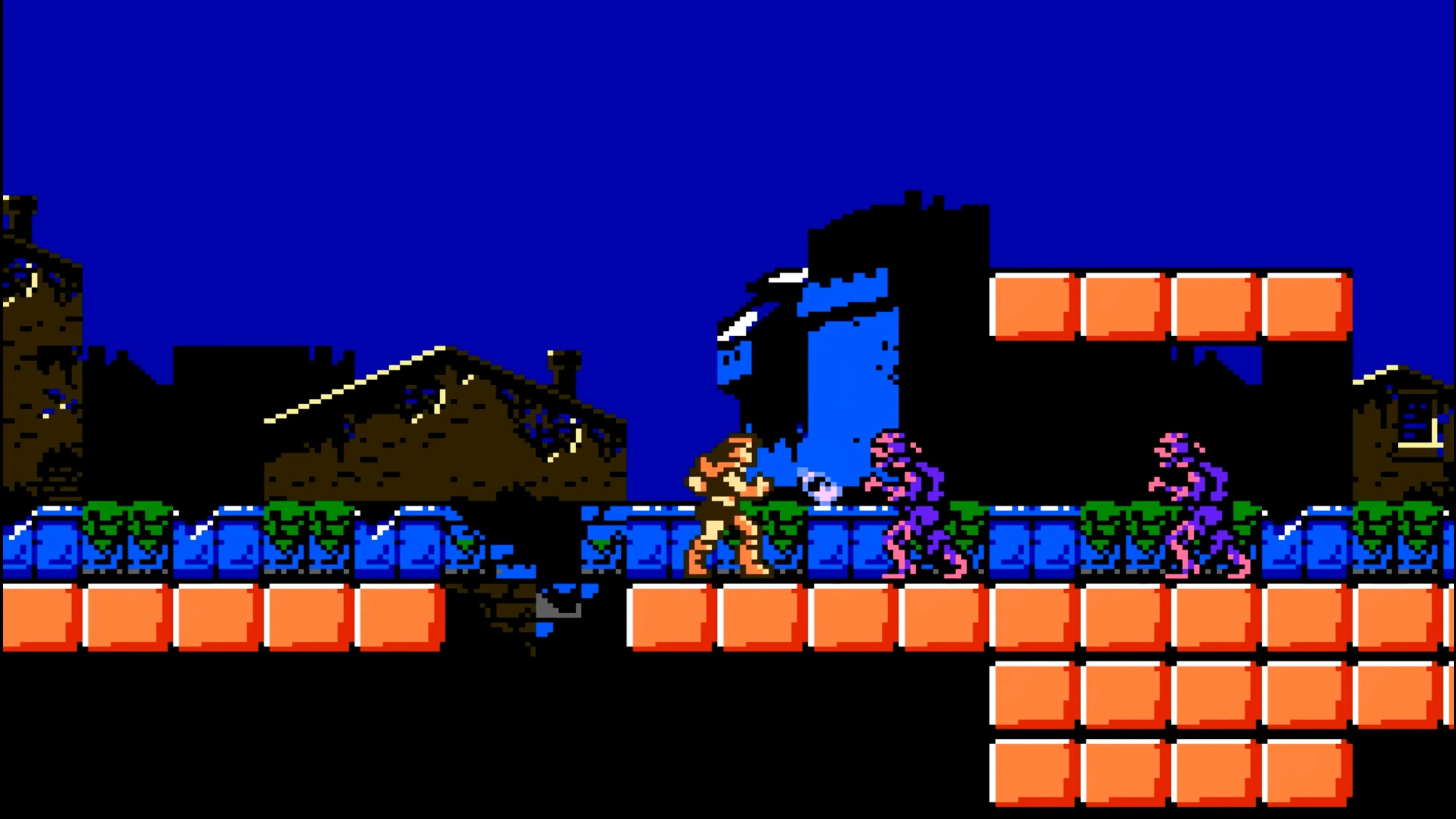 Trevor Belmont đối mặt với quái vật trong một lâu đài tối tăm trong Castlevania III.